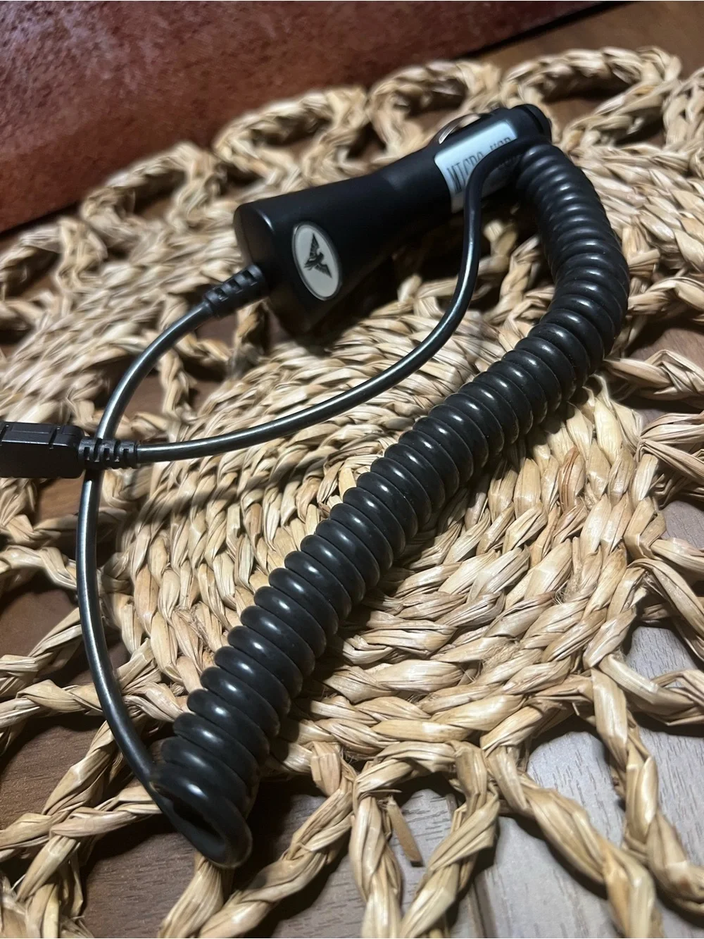 Compact Black Coiled Car Charger Cable with USB Connector
